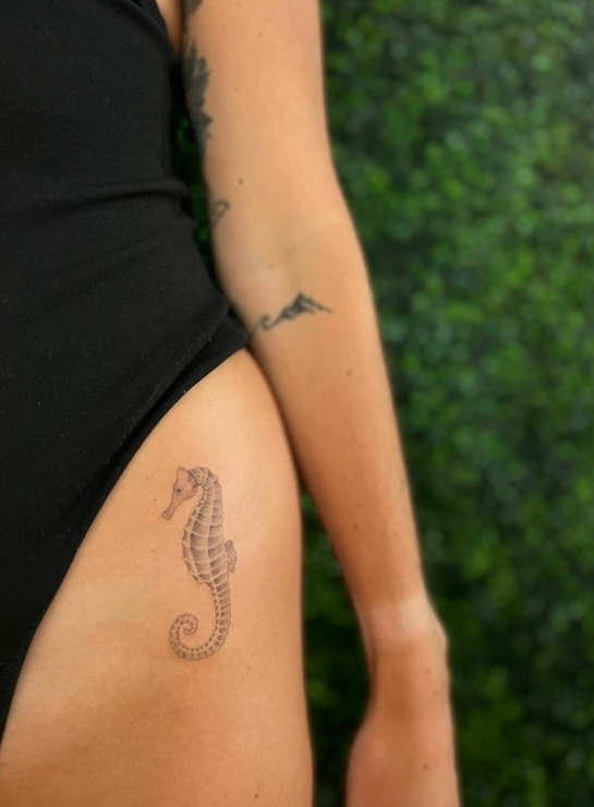 Tatouage de cuisse hippocampe