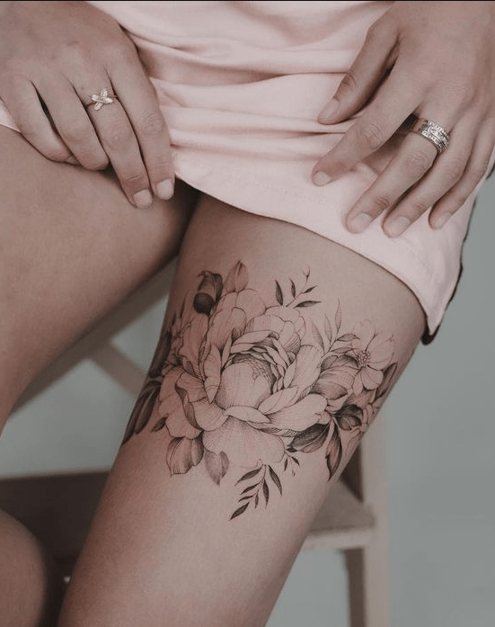 Tatouage intérieur de la cuisse