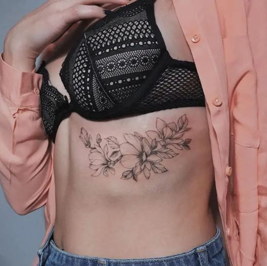 Tatouage Anémone Sur Les Côtes Pour Femme 