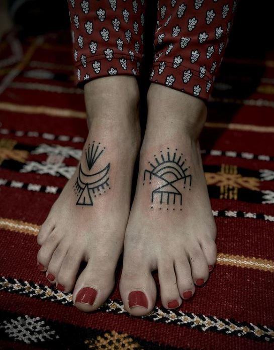 Tatouage Femme Symbole