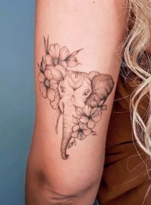 Tatouage Bras Fleur Et éléphant