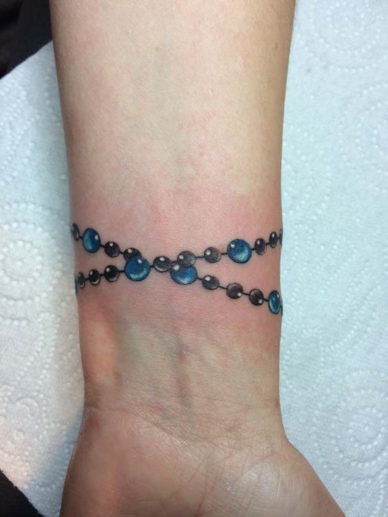 Tatouage Bracelet Avec Perles Bleues Et Noires