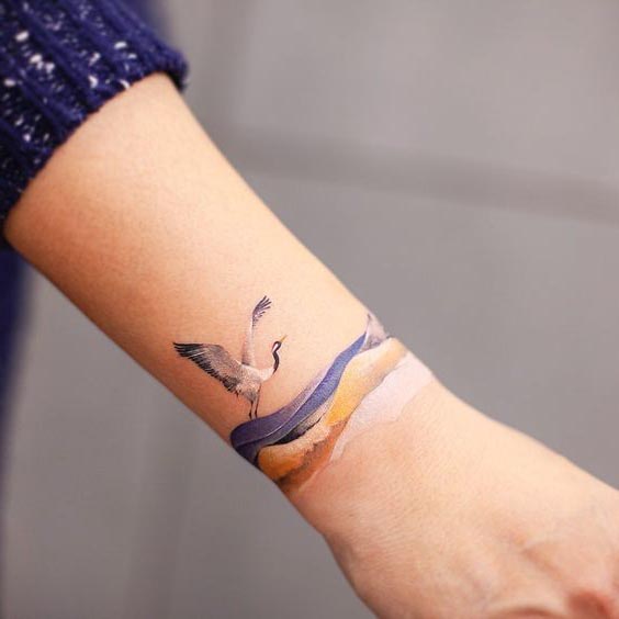 Tatouage Bracelet Avec Cigogne 