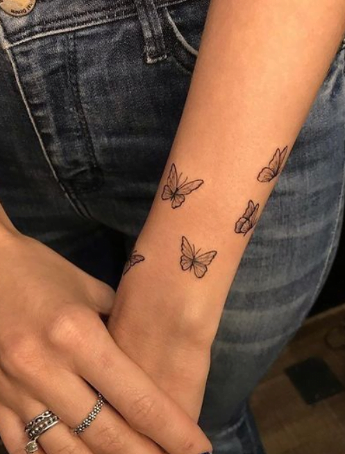 Envolée de papillons sur les poignets