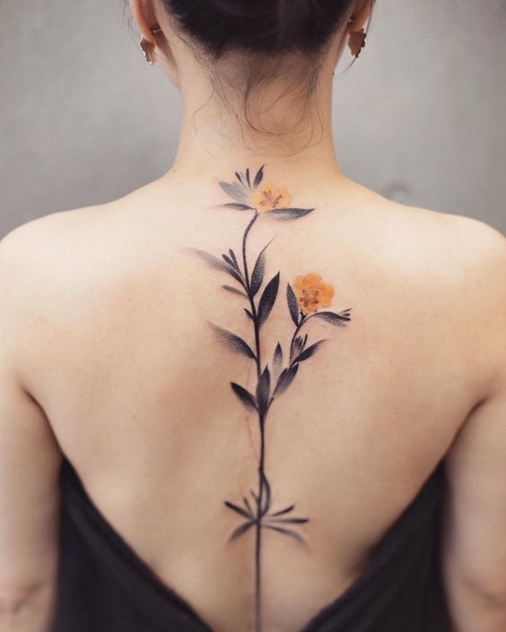 tatouage Fleurs Jaunes colonne vertebrale