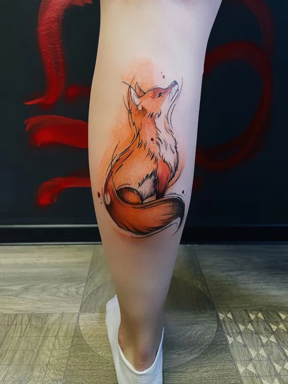 tatouage renard sur le mollet