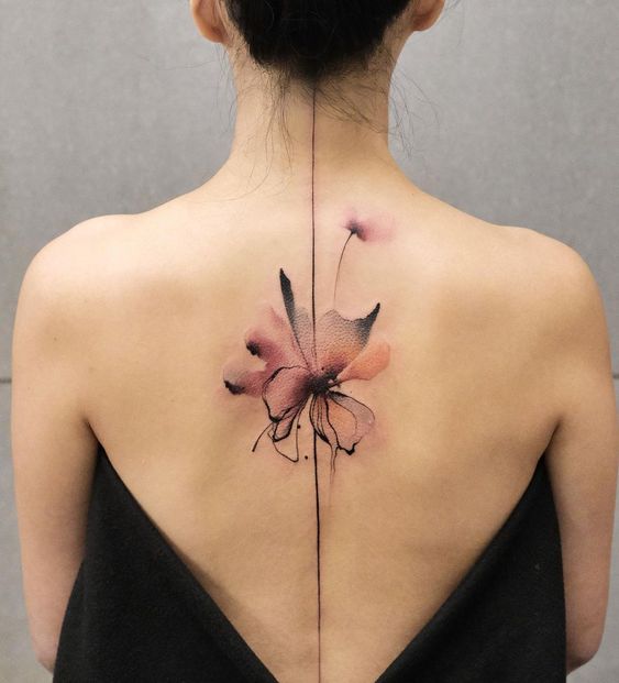 tatouage Fleur grenat sur une ligne