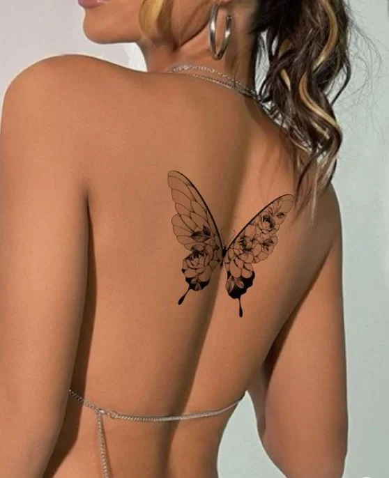 Papillon à Ailes Fleuries Sur Le Dos