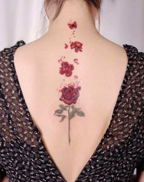 Tatouage Nuque Et Dos Papillon Et Roses Rouges 