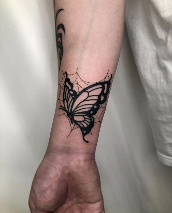 Tatouage Papillon Homme Spider Sur Le Poignet 