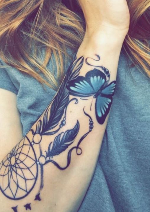 Tatouage Papillon Et Attrape Rêve Sur L'avant Bras