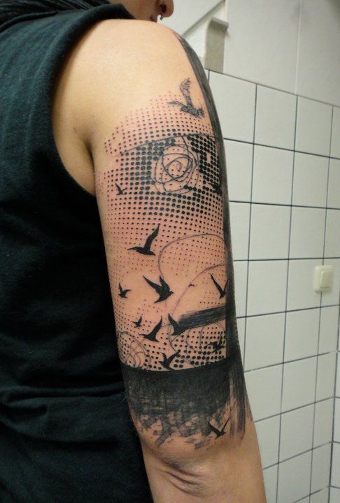 tatouage graphique Oiseaux sur le bras