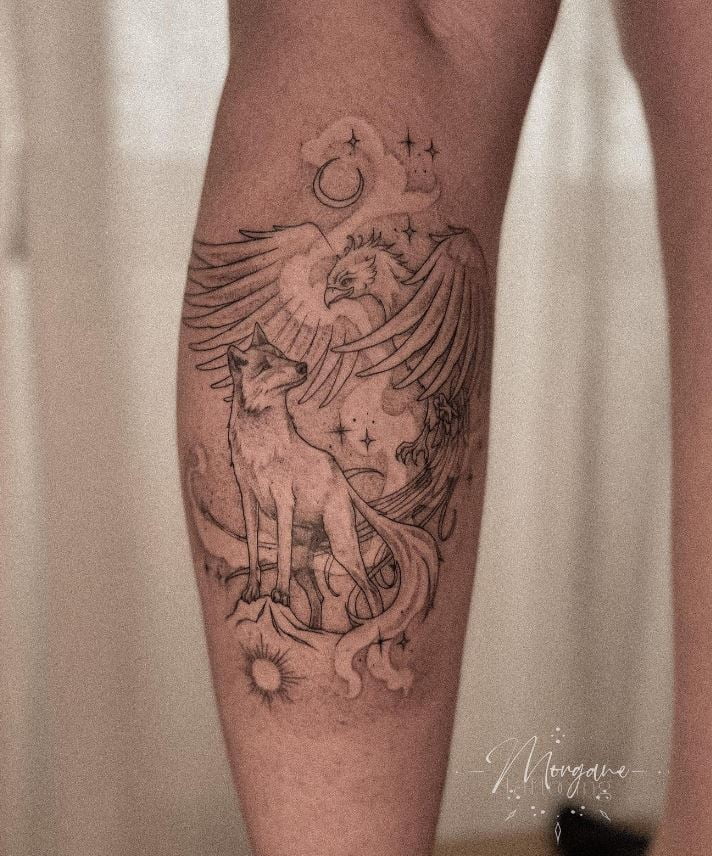  Tatouage De Loup Et Phoenix Sur Le Mollet