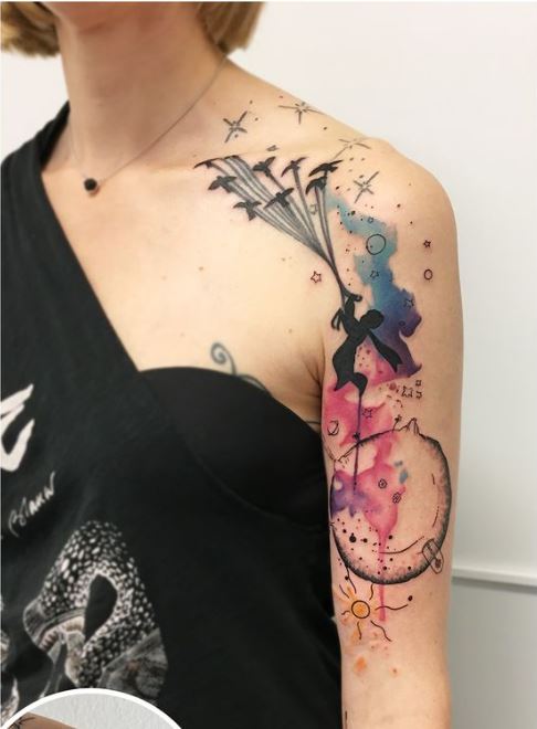 tatouage graphique Enfant sur le bras femme