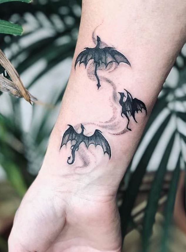 Tatouage Trio De Dragon Sur L'avant Bras 