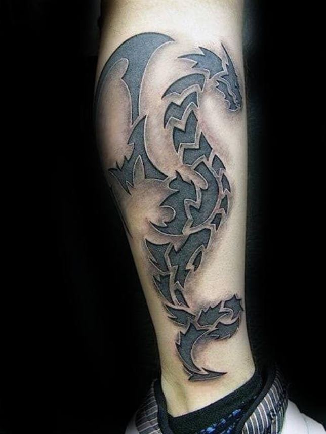 Tatouage De Dragon Tribal Sur La Jambe 