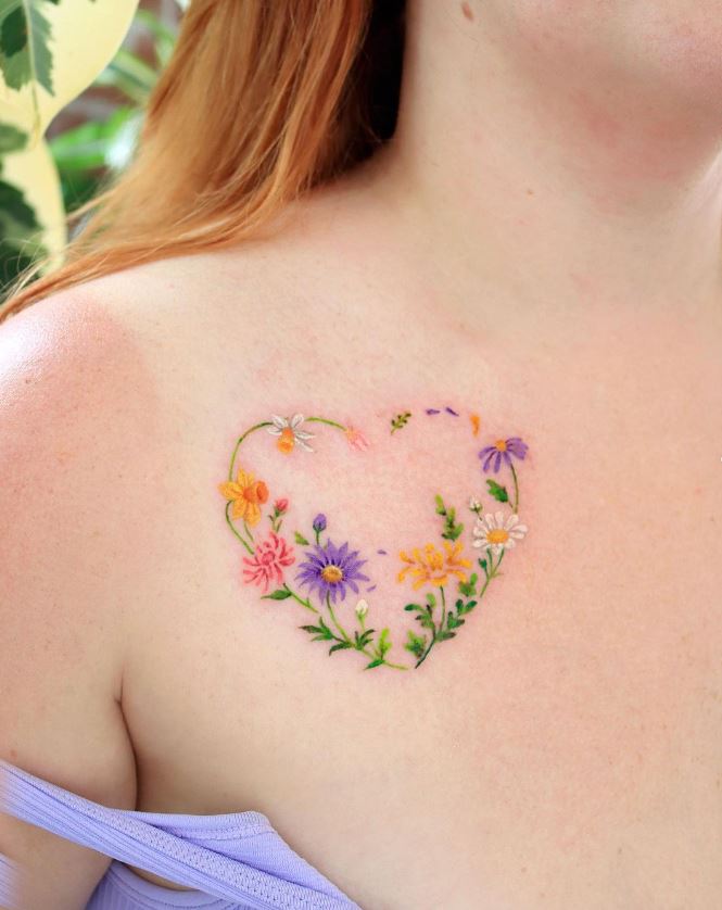 Tatouage Coeur Floral Sur La Clavicule 