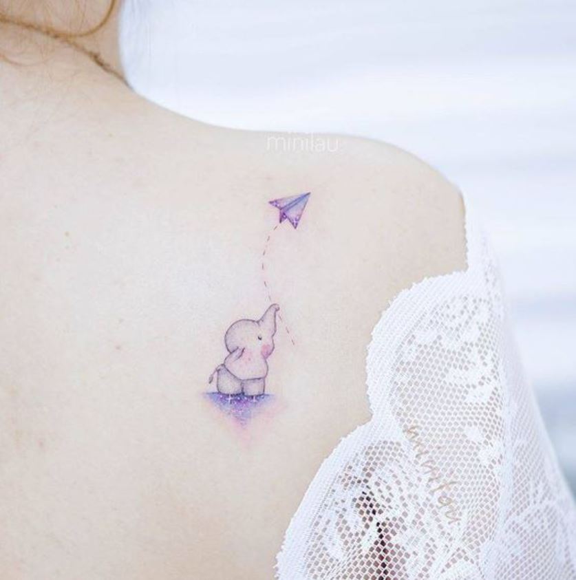 Tatouage éléphanteau Et Avion En Papier