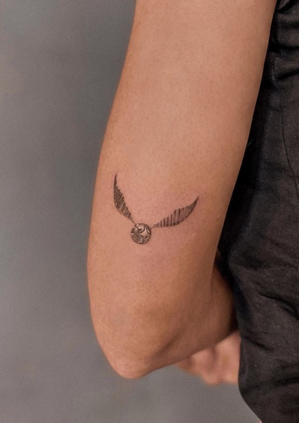 Tatouage Harry Potter Snitch D'or D'antonela Roccuzzo 