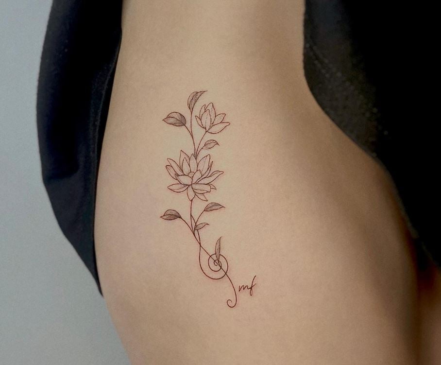  Tatouage Fleur De Lotus Et Note De Musique 