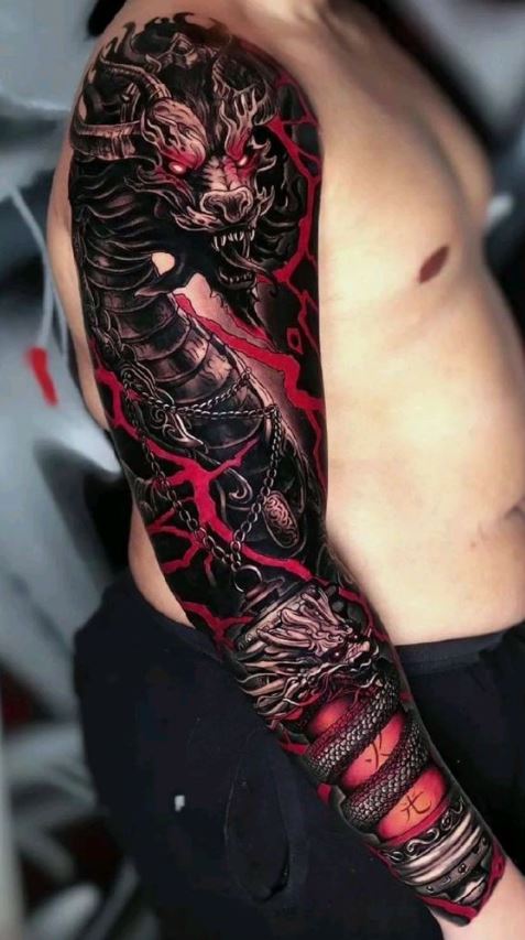 Tatouage Bras Homme Dragons Enchaînés 