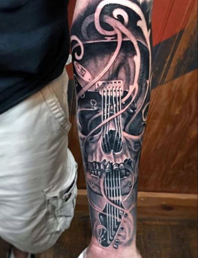 Tatouage Avant Bras Homme Guitare Et Crâne